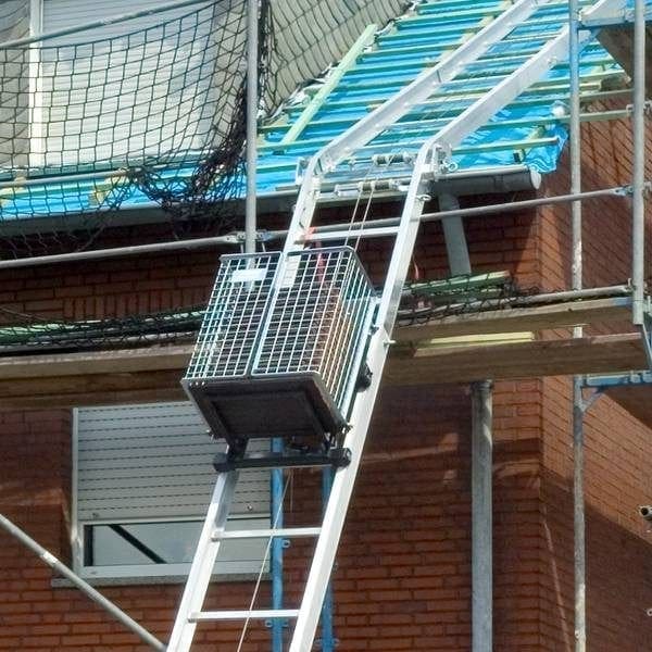 Construction lift with tile holder Construction lift with tile holder
