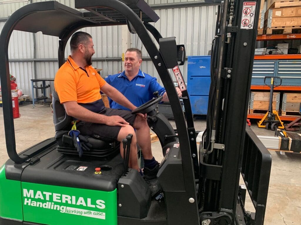 Materials Handing GM Gary Doherty with employee 4 Materials Handing GM Gary Doherty with employee 4